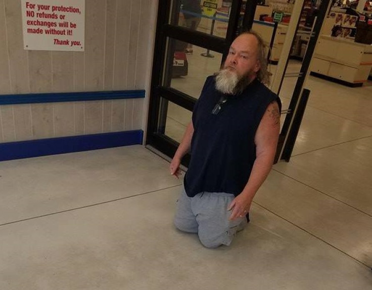 Disabled man forced to crawl out ofshop