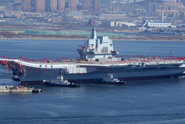 China’s ministry ‘sincerely sorry’ after internet mocks badly photoshoped picture of aircraft carrier 