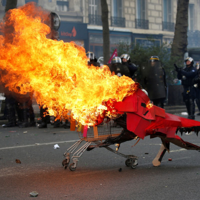 Protestors clash with riot police during May Day labour union march in Paris