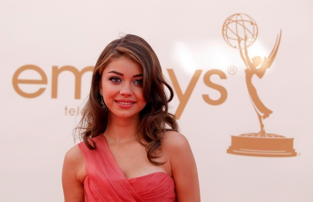 Actress Sarah Hyland from "Modern Family" poses as she arrives at the 63rd Primetime Emmy Awards in Los Angeles