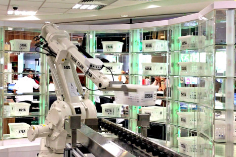 Robot arm automating medication dispensing in Singapore