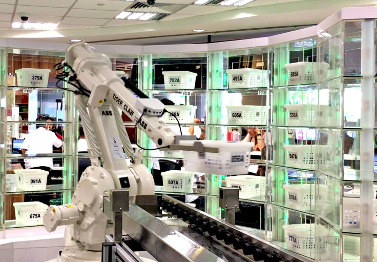 Robot arm automating medication dispensing in Singapore