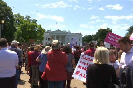 White House Protesters Demand Probe of Comey Dismissal