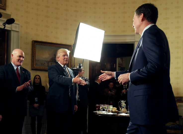 Donald Trump greets James Comey