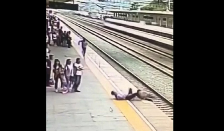 Railway staff saves woman