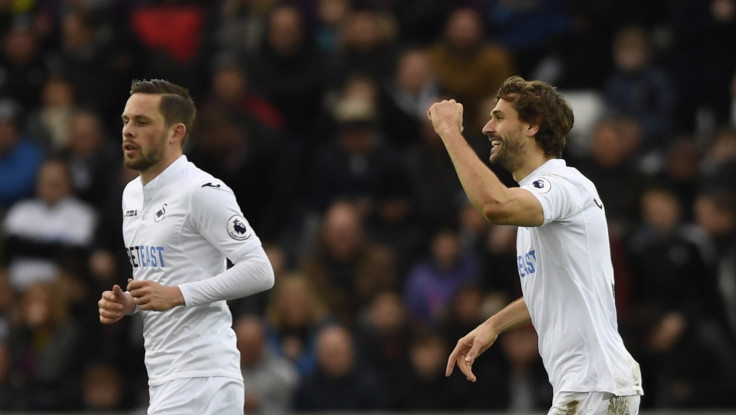 Gylfi Sigurdsson and Fernando Llorente