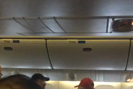 Belligerent man wearing Trump hat kicked off United flight