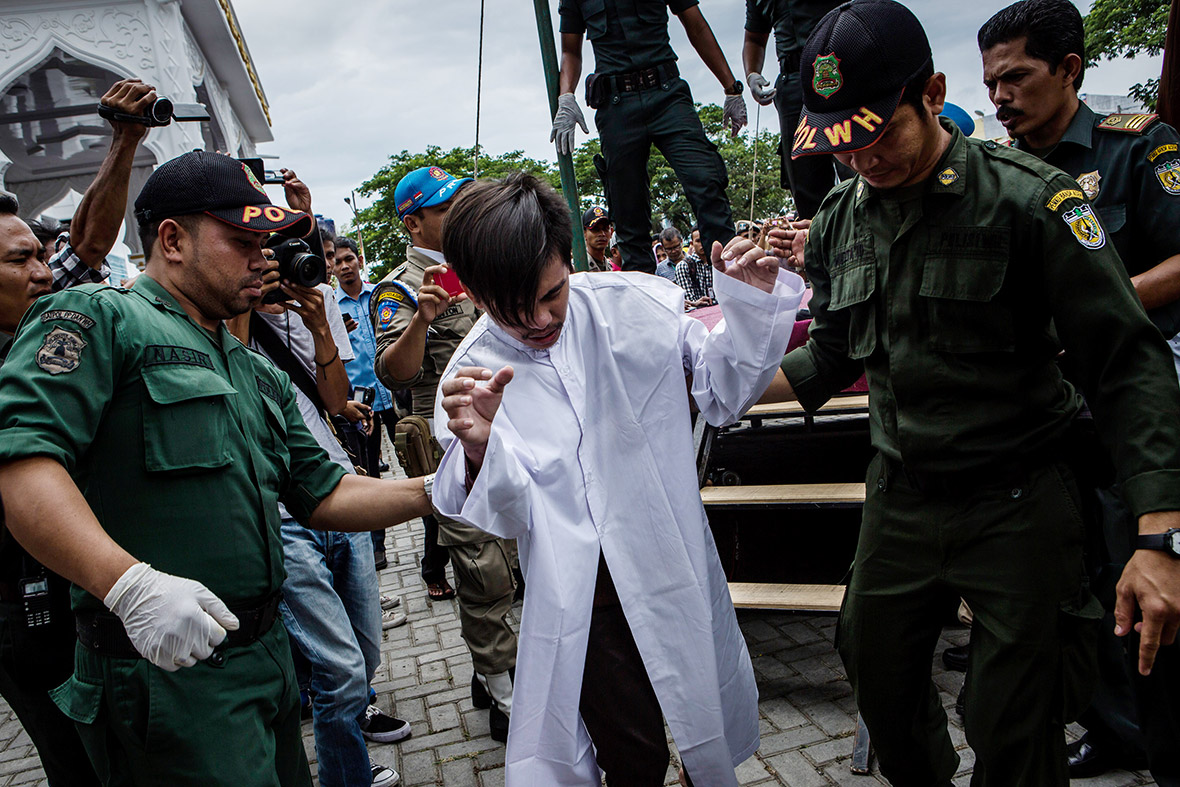 Gay Couple Publicly Caned By Hooded Religious Police In Indonesias