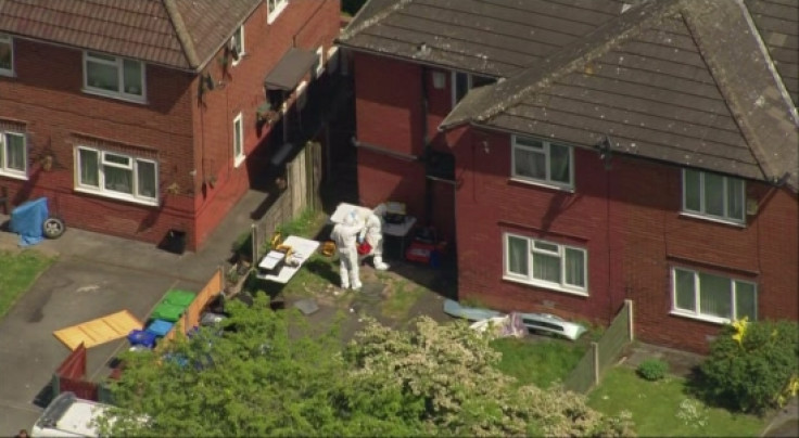 Police search houses in Manchester terror raids
