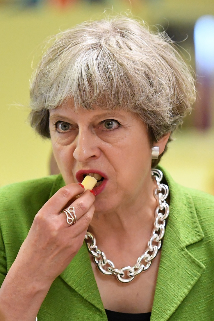 Theresa May eating cheese