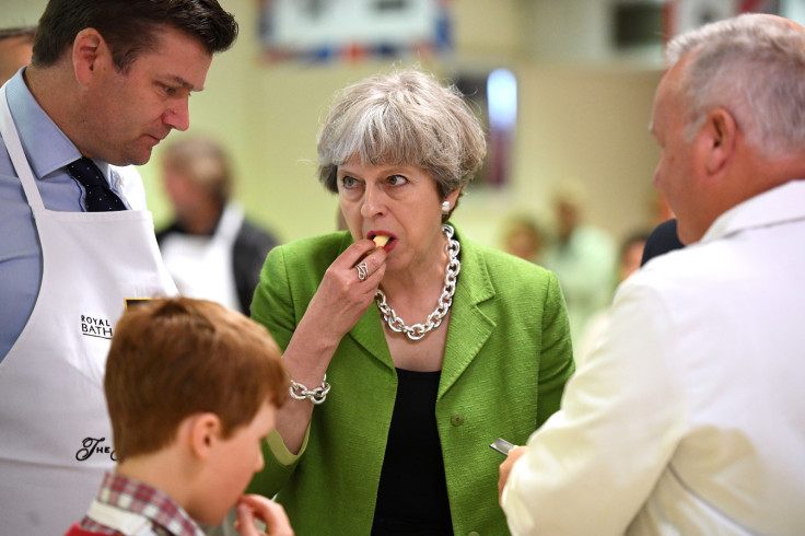 Theresa May eating cheese