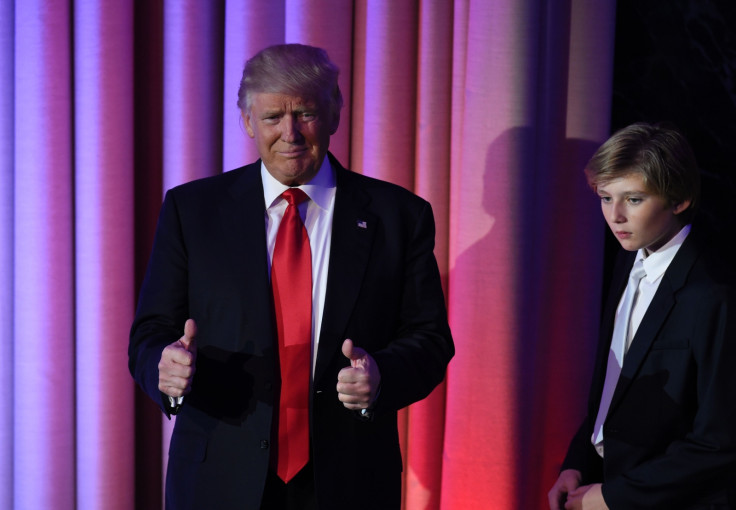 US President-elect Donald Trump arrives with his son Barron