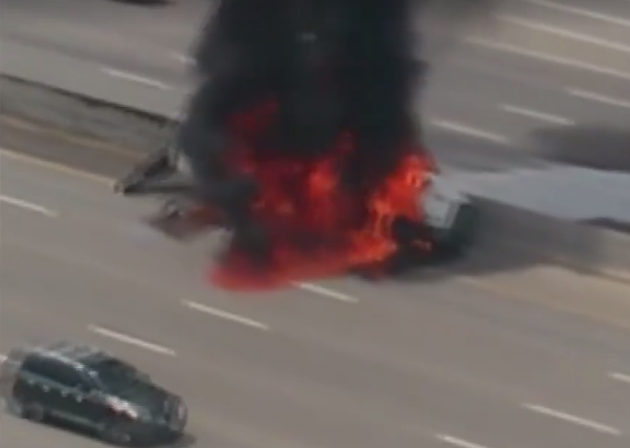 Watch dramatic rescue of driver from his burning fuel