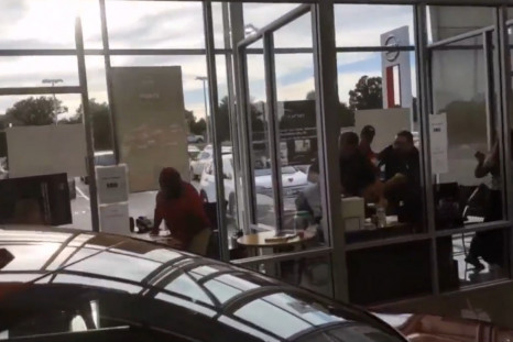 Deadly Shootout Captured On Camera in Car Dealership