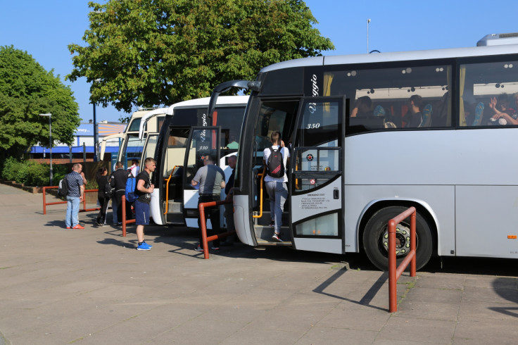 Immigrant busses waiting for workers in Boston