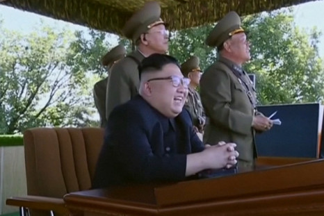 Watch A Childlike Kim Jong-un Chuckle At North Korean Military Display