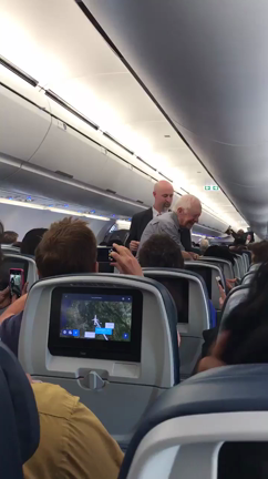 Jimmy Carter shakes the hand of everyone on his flight