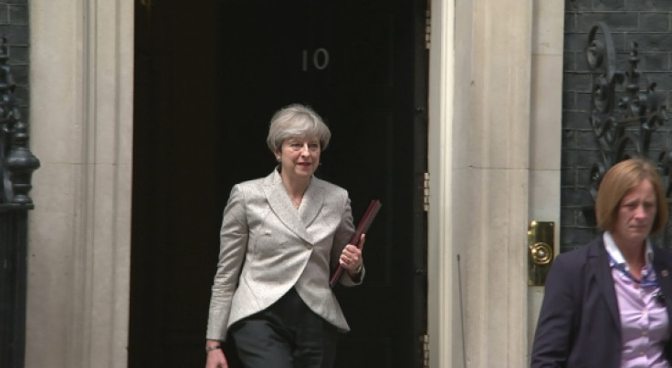 Theresa May Departs Downing Street for France Visit