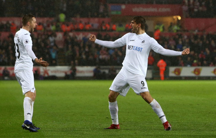 Gylfi Sigurdsson and Fernando Llorente