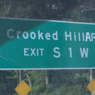 Crooked Hillary road sign