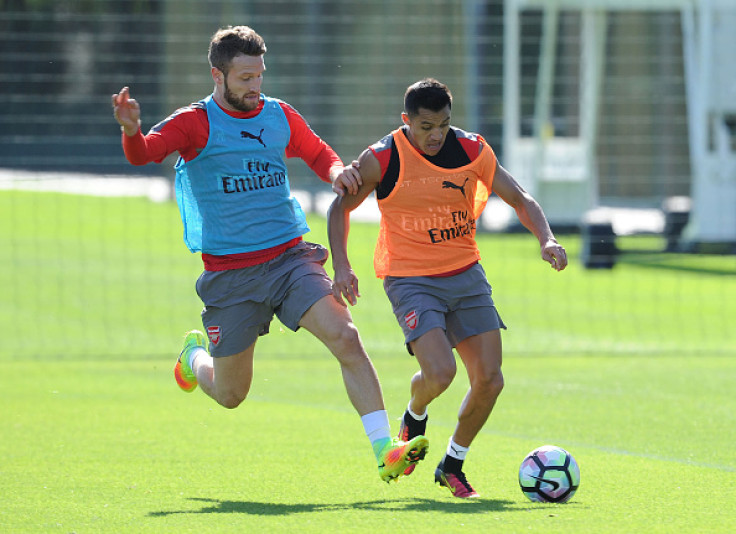 Shkodran Mustafi and Alexis Sanchez