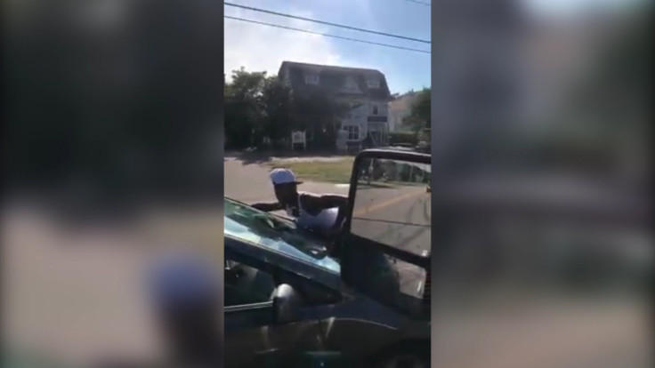 Woman Clings Onto Car In Bizarre Traffic Incident Woman Clings Onto Car In Bizarre Traffic Incident
