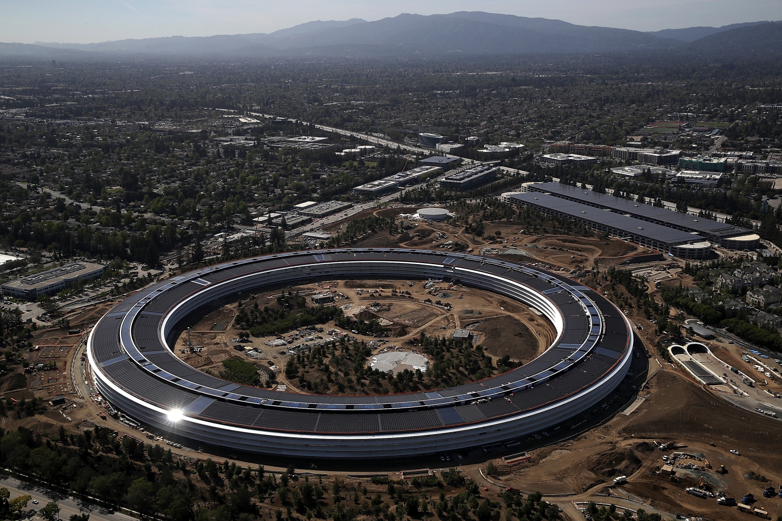 Watch: Stunning footage provides bird's eye view of Apple Park and its ...