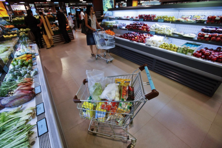 A trolley of fresh and packed food items in a super market