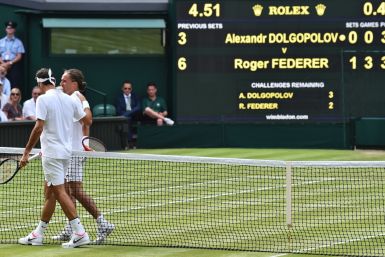 Roger Federer and Alexandr Dolgopolov