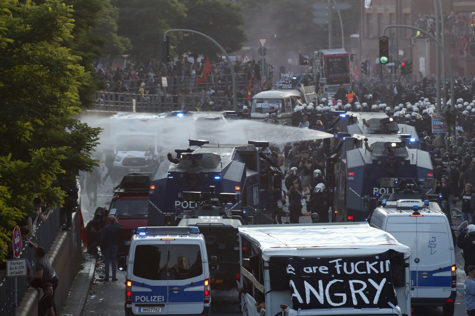 Riot police use water cannons in Hamburg