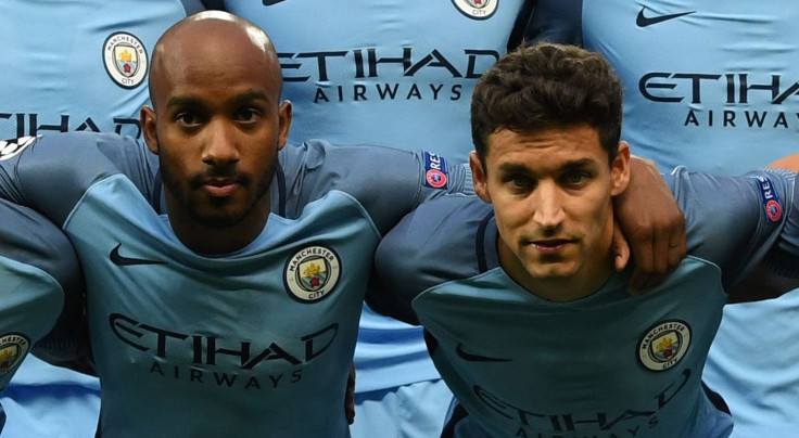 Fabian Delph and Jesus Navas