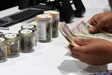 Customer pays for legal marijuana in Nevada
