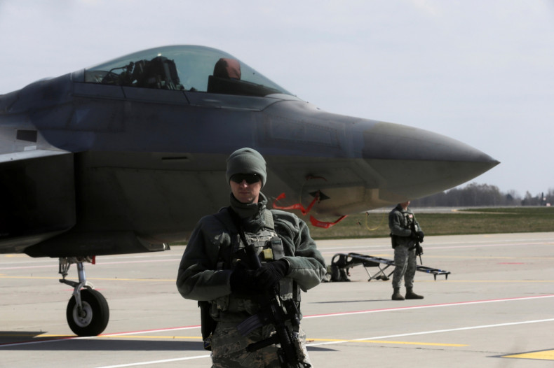 US Air Force guards F-22 fighter jet