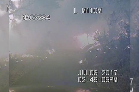 Dramatic Footage Shows Police Rescuing Campers Stranded By Whittier Fire
