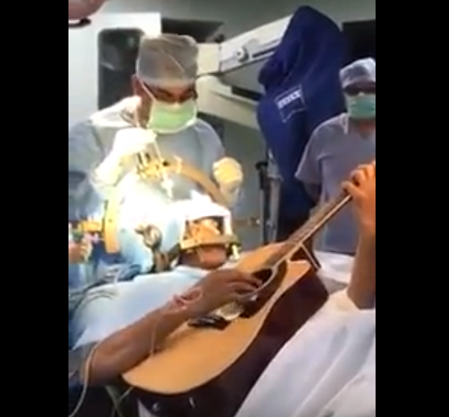 Bengaluru man treats himself by playing guitar during brain surgery Bengaluru man treats himself by playing guitar during brain surgery