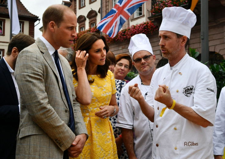 Duke of Cambridge (L) and his wife the Duchess of Cambridge