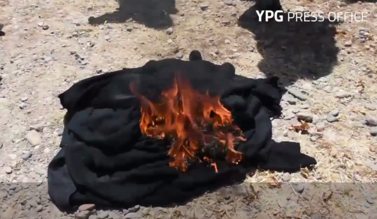 burqa burning raqqa isis syria