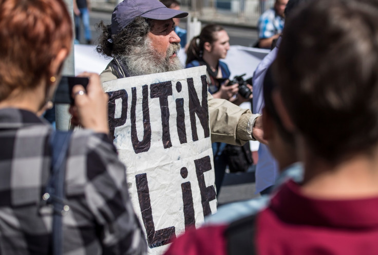 Putin lies sign