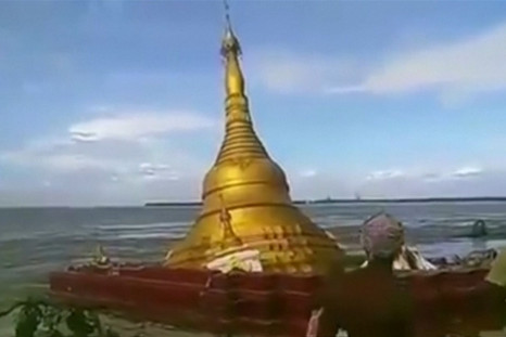 Rising River Water Levels Causes Myanmar Pagoda To Collapse