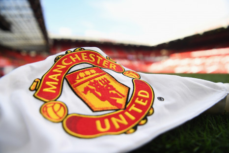 Manchester United logo shirt pitch