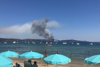 Flames seen from beach in France