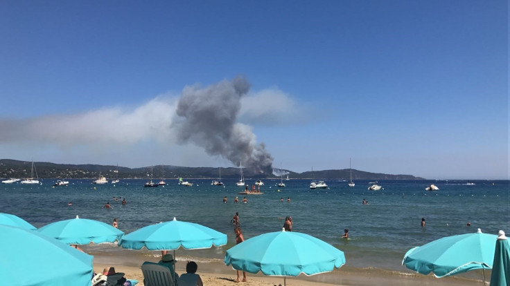 Flames seen from beach in France