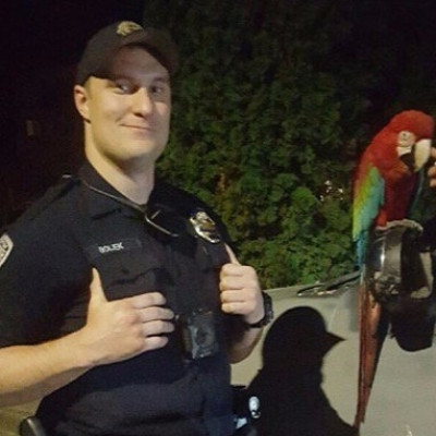 Police officer and parrot
