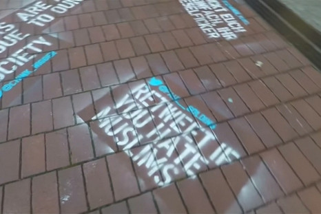 Artist Stencils ‘Hate Tweets’ Outside Twitter's Hamburg Office To Highlight Abuse On The Site