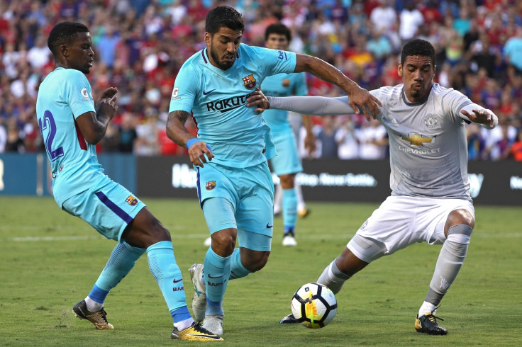 Luis Suarez and Chris Smalling