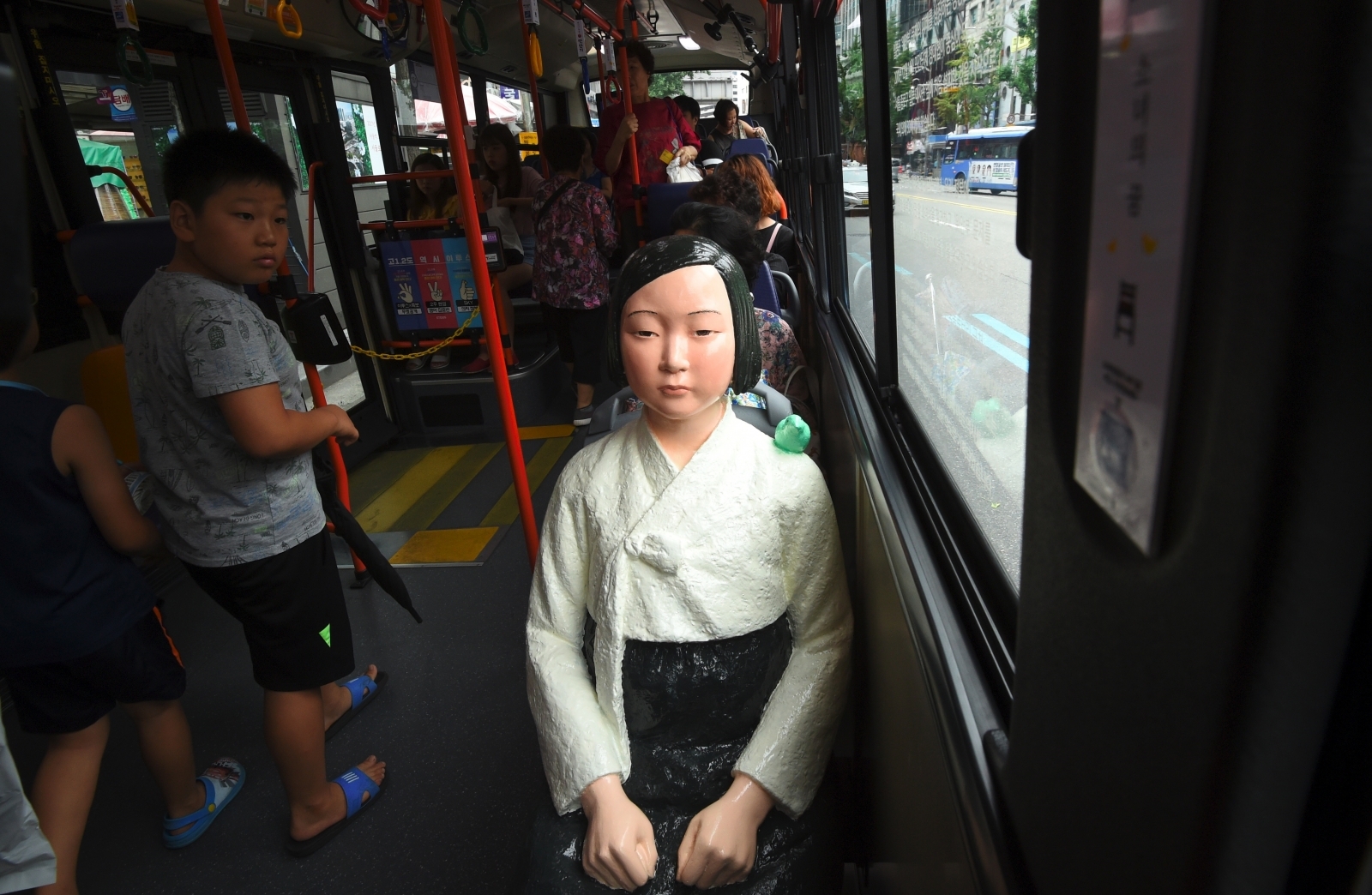 South Korea Installs Statues Of Comfort Women On Buses In Stark Reminder Of Wwii Horror