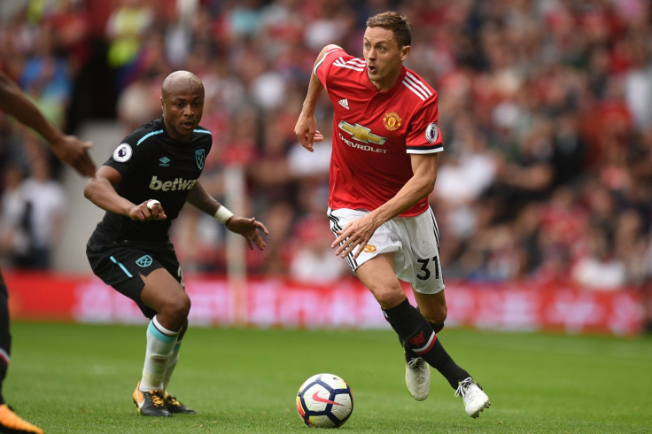 Andre Ayew and Nemanja Matic