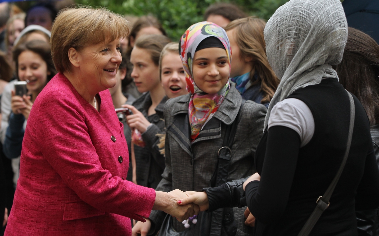 Migrant family names daughter 'Angela Merkel Muhammed' in ...