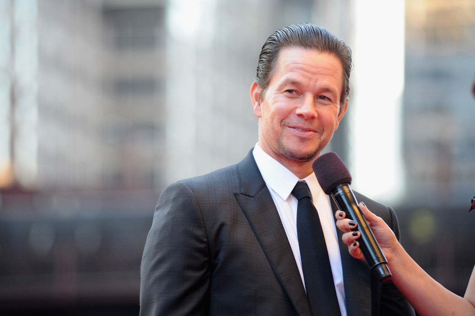 Mark Wahlberg dethrones Dwayne 'The Rock' Johnson as world's highest ...