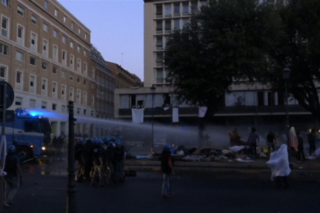 Police Use Water Cannons On Refugees In Rome